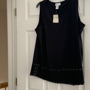 Beautiful black top. Never worn, studded and in perfect condition